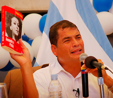President Rafael Correa of Ecuador shows Virginia’s book in camera, 2008