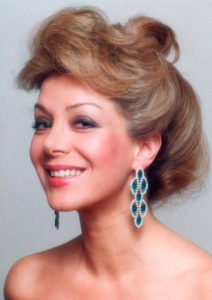 Virginia with earrings of Saint Laurent, 1987
