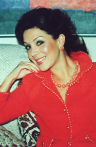 Virginia in Chanel and her coral jewels, 1980